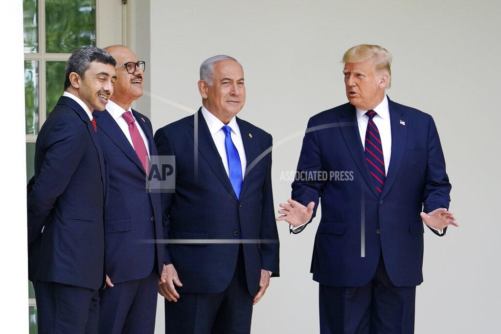 Alex Brandon President Donald Trump walks to the Abraham Accords signing ceremony at the White House, Tuesday, Sept. 15, 2020, in Washington with Israeli Prime Minister Benjamin Netanyahu, Bahrain Foreign Minister Khalid bin Ahmed Al Khalifa and United Arab Emirates Foreign Minister Abdullah bin Zayed al-Nahyan. (AP Photo/Alex Brandon)
