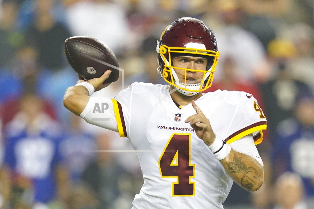 Patrick Semansky Washington Football Team quarterback Taylor Heinicke (4) throwing the ball during the first half of an NFL football game against the New York Giants, Thursday, Sept. 16, 2021, in Landover, Md. (AP Photo/Patrick Semansky)