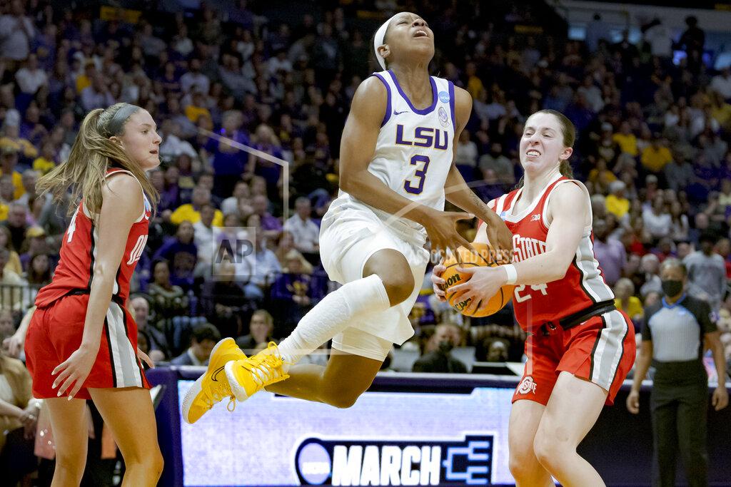 Matthew Hinton As LSU guard Khayla Pointer (3) goes up to shoot, Ohio State guard Taylor Mikesell (24) grabs the ball from her hands for a steal as Ohio State guard Jacy Sheldon, left, watches during the second half of a women's college basketball game in the second round of the NCAA tournament, Monday, March 21, 2022, in Baton Rouge, La. (AP Photo/Matthew Hinton)