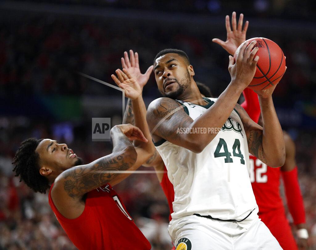 Jeff Roberson Michigan State's Nick Ward (44) drives against Texas Tech's Kyler Edwards (0) during the second half in the semifinals of the Final Four NCAA college basketball tournament, Saturday, April 6, 2019, in Minneapolis. (AP Photo/Jeff Roberson)