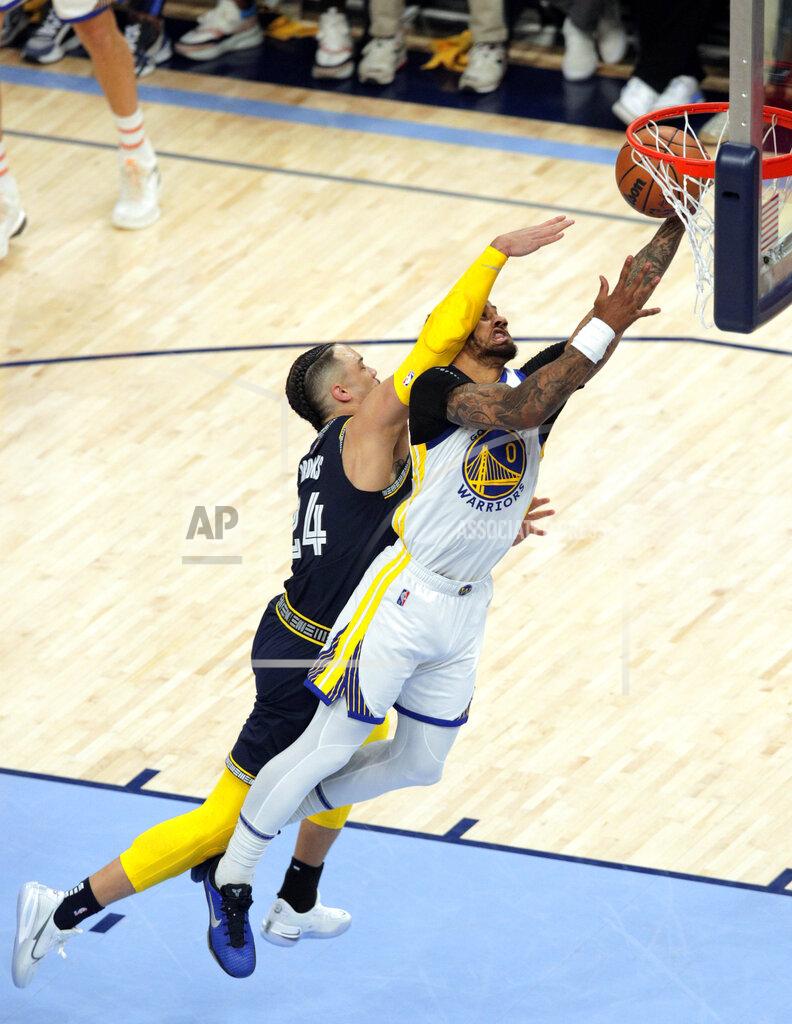 Carlos Avila Gonzalez Golden State Warriors' Gary Payton II (0) is fouled by Memphis Grizzlies' Dillon Brooks (24) during the first quarter of Game 2 in an NBA basketball second-round playoff series in Memphis, Tenn., Tuesday, May 3, 2022. (Carlos Avila Gonzalez/San Francisco Chronicle via AP)