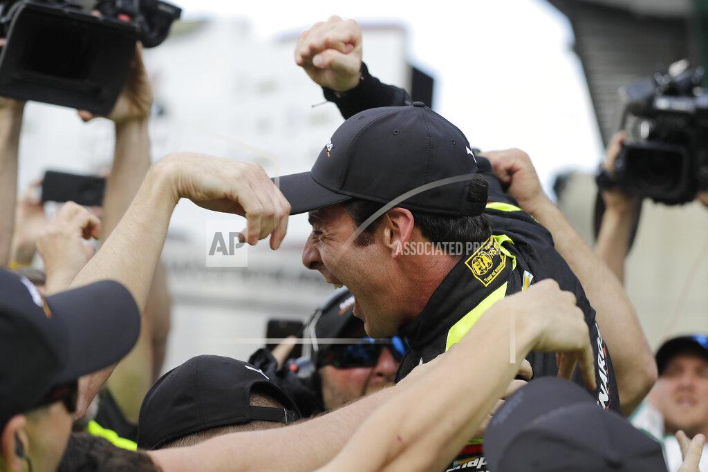 Darron Cummings Simon Pagenaud, of France, celebrates with his crew after winning the pole for the Indianapolis 500 IndyCar auto race at Indianapolis Motor Speedway, Sunday, May 19, 2019 in Indianapolis. (AP Photo/Darron Cummings)