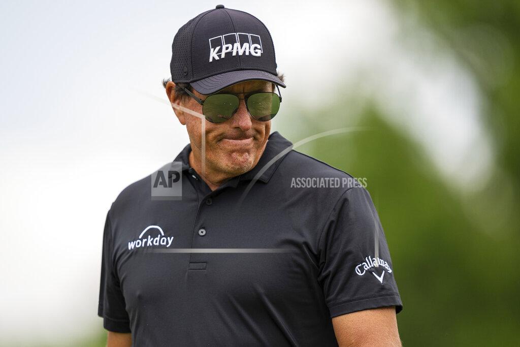 Jacob Kupferman Phil Mickelson looks down after finishing on the first hole during the third round of the Wells Fargo Championship golf tournament at Quail Hollow on Saturday, May 8, 2021, in Charlotte, N.C. (AP Photo/Jacob Kupferman)