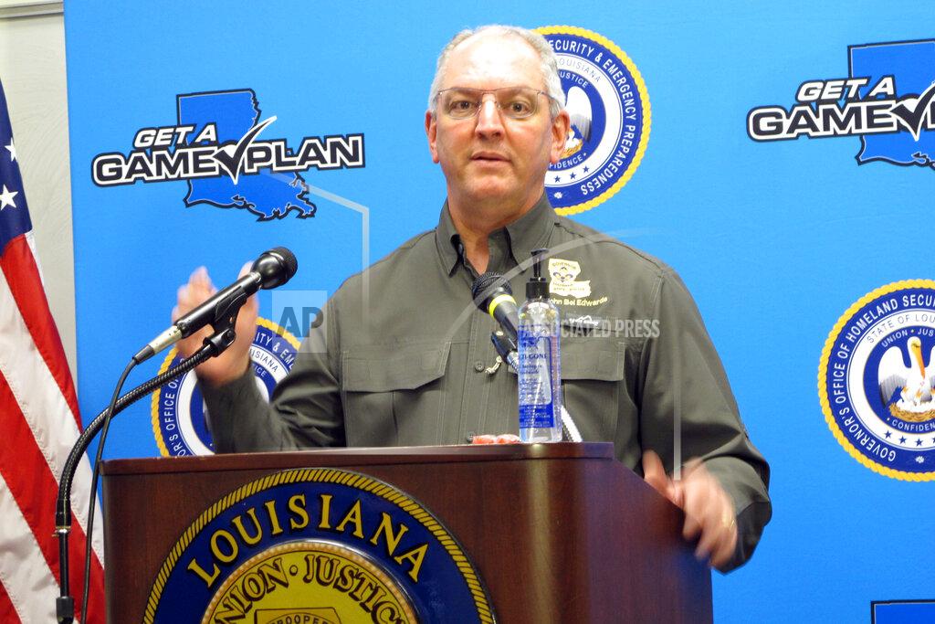 Melinda Deslatte Louisiana Gov. John Bel Edwards talks about the expected impact of Hurricane Laura, Tuesday, Aug. 25, 2020, in Baton Rouge, La. (AP Photo/Melinda Deslatte)