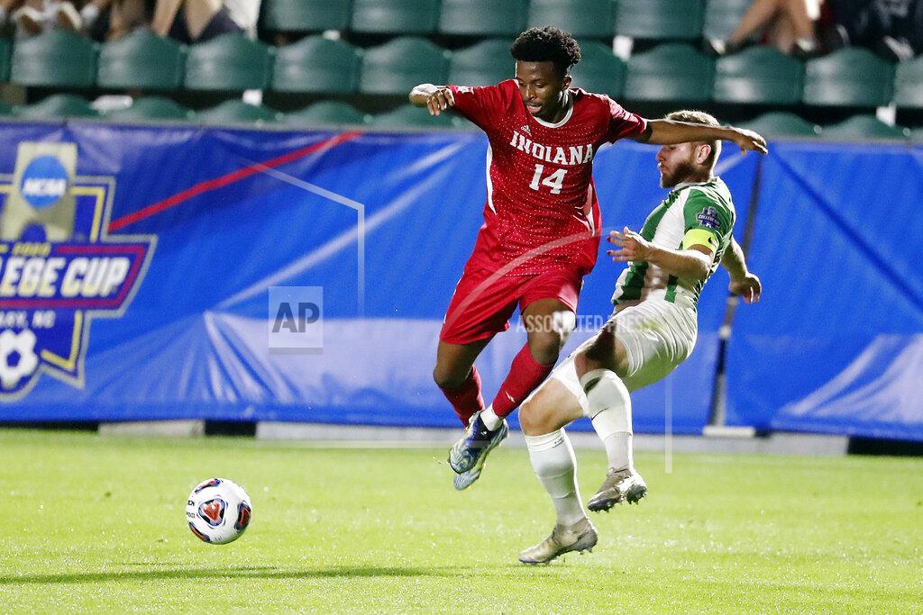 Karl B Deblaker Indiana's Maouloune Goumballe (14) collides with Marshall's Jan-Erik Leinhos (30) during the first half of the NCAA College Cup championship soccer match in Cary, N.C., Monday, May 17, 2021. (AP Photo/Karl B DeBlaker)