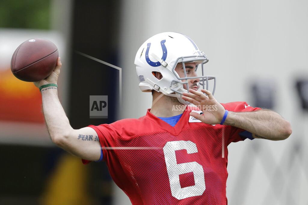 Indianapolis Colts quarterback Chad Kelly (6) throws during a drill as the team practiced at the NFL football team's facility, Wednesday, May 29, 2019, in Indianapolis. (AP Photo/Darron Cummings)