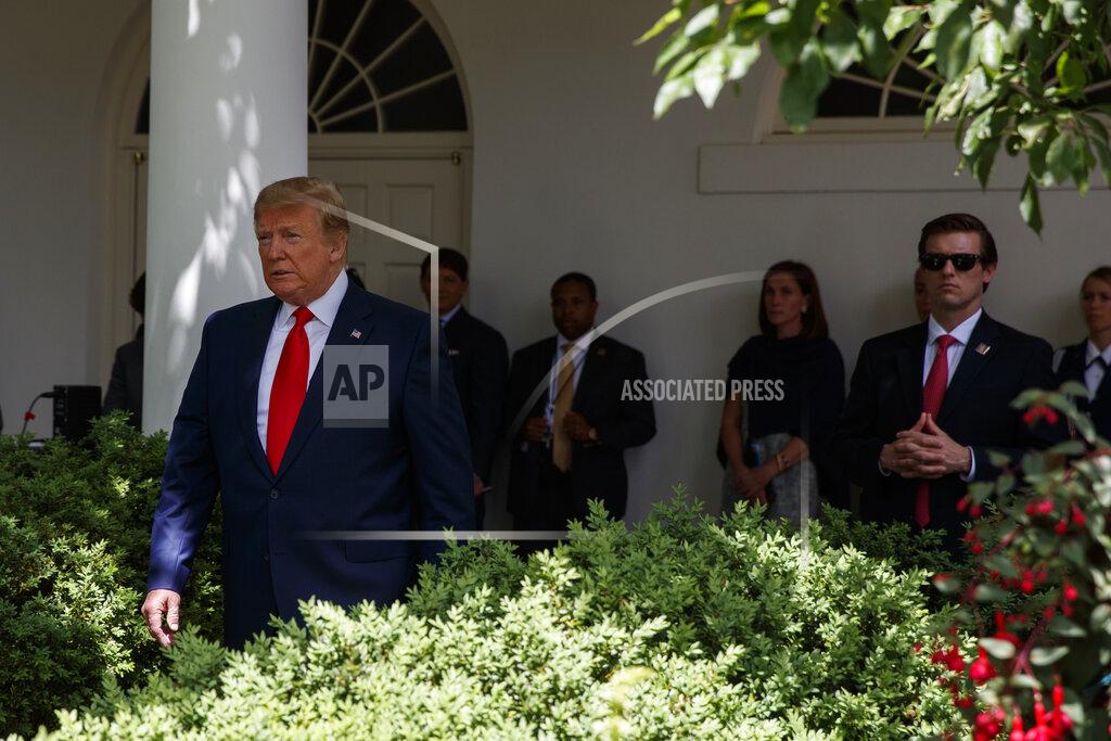 Evan Vucci President Donald Trump arrives to speak during the presentation of the Commander-in-Chief's Trophy to the U.S. Military Academy at West Point football team, in the Rose Garden of the White House, Monday, May 6, 2019, in Washington. (AP Photo/Evan Vucci)