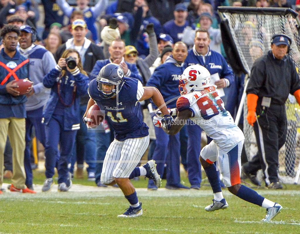 Howard Simmons Notre Dame safety Alohi Gilman (11) returns interception during an NCAA college football game against Syracuse, Saturday, Nov. 17, 2018, at Yankee Stadium in New York. (AP Photo/Howard Simmons)