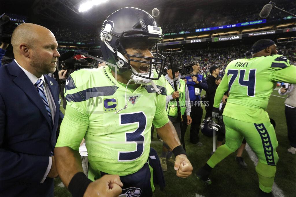 Elaine Thompson Seattle Seahawks quarterback Russell Wilson reacts after the Seahawks defeated the Los Angeles Rams 30-29 in an NFL football game Thursday, Oct. 3, 2019, in Seattle. (AP Photo/Elaine Thompson)