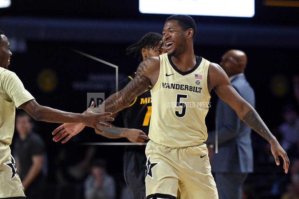 Mark Zaleski Vanderbilt guard Shane Dezonie (5) celebrates after making a 3-point basket against Missouri during the second half of an NCAA college basketball game Tuesday, Feb. 8, 2022, in Nashville, Tenn. Vanderbilt won 70-62. (AP Photo/Mark Zaleski)