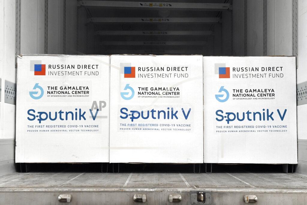 Zoltan Mathe Boxes of Sputnik V vaccines are ready to be unloaded from a truck at a warehouse of Hungaropharma, a Hungarian pharmaceutical wholesale company, in Budapest, Hungary, Thursday, March 4, 2021. (Zoltan Mathe/MTI via AP)
