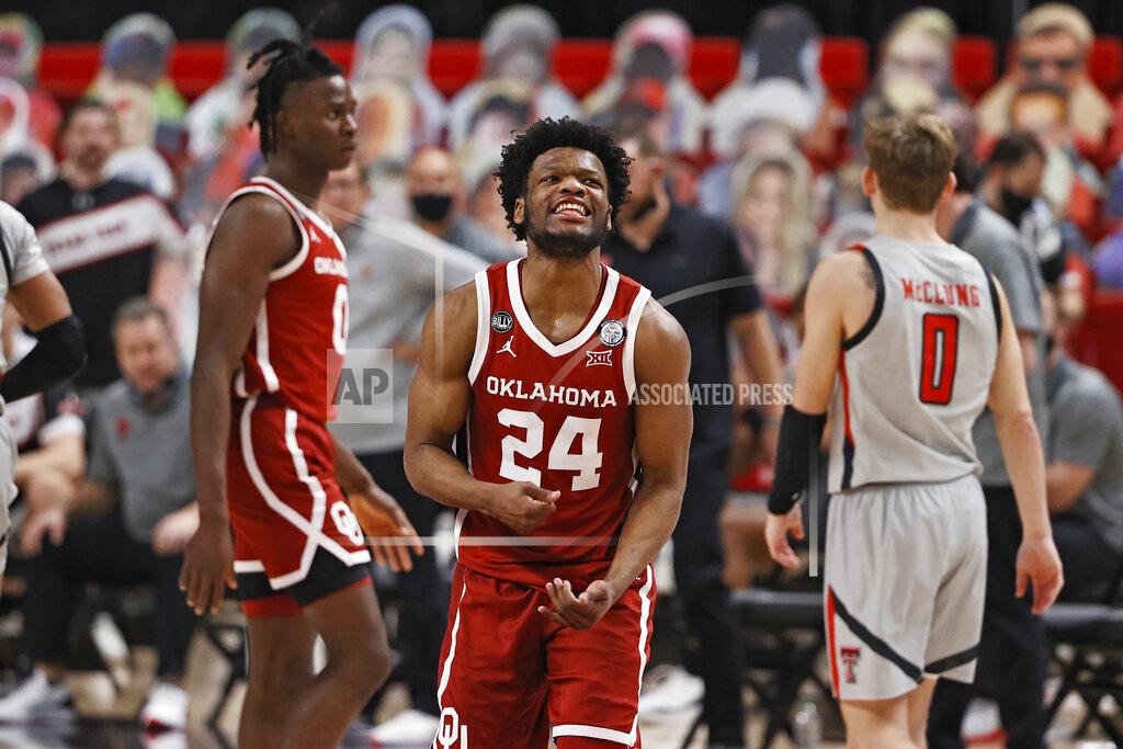 Brad Tollefson Oklahoma's Elijah Harkless (24) reacts after fouling Texas Tech's Terrence Shannon Jr. (not shown) during the second half of an NCAA college basketball game Monday, Feb. 1, 2021, in Lubbock, Texas. (AP Photo/Brad Tollefson)