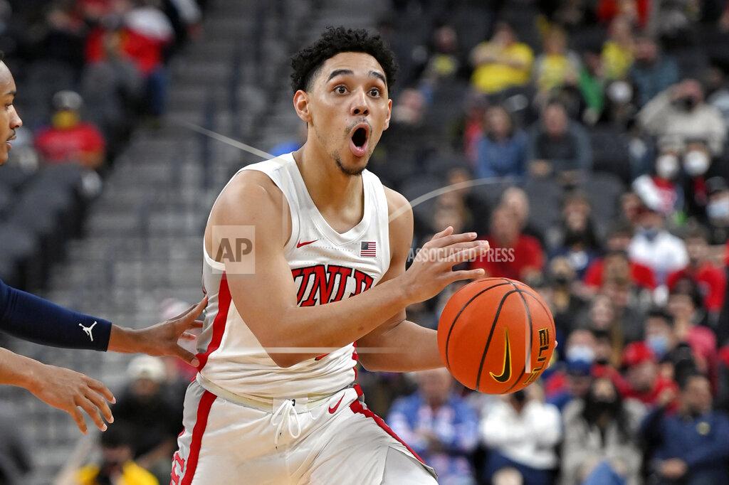 David Becker UNLV guard Marvin Coleman reacts during the first half of the team's NCAA college basketball game against Michigan on Friday, Nov. 19, 2021, in Las Vegas. (AP Photo/David Becker)