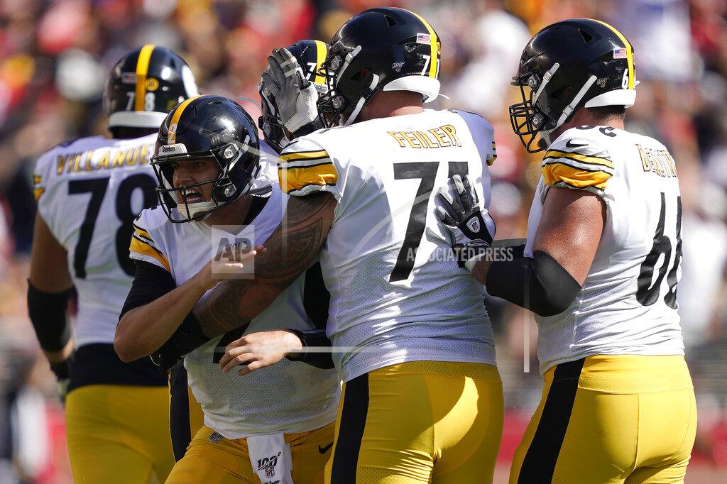 Tony Avelar Pittsburgh Steelers quarterback Mason Rudolph, center left, celebrates with teammates after throwing a touchdown pass to wide receiver JuJu Smith-Schuster during the second half of an NFL football game against the San Francisco 49ers in Santa Clara, Calif., Sunday, Sept. 22, 2019. (AP Photo/Tony Avelar)