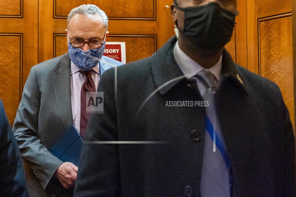 Manuel Balce Ceneta Senate Majority Leader Chuck Schumer of N.Y, takes the elevator in the U.S. Capitol , Friday, Jan. 22, 2021, in Washington. (AP Photo/Manuel Balce Ceneta)