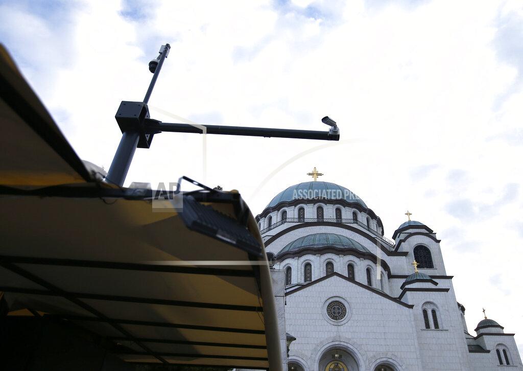 Darko Vojinovic A security camera is seen in front of St. Sava Temple during church closed session in Belgrade, Serbia, Thursday, Feb. 18, 2021. The Serbian Orthodox Church gathers in closed session to pick a new Patriarch, following the death of old one Irinej. Irinej died last year of COVID, following the outbreak of virus among church officials in Belgrade. (AP Photo/Darko Vojinovic)