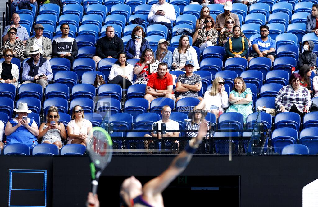 Rick Rycroft Spectators watch the third round match between Aryna Sabalenka of Belarus and United States' Ann Li at the Australian Open tennis championship in Melbourne, Australia, Friday, Feb. 12, 2021.(AP Photo/Rick Rycroft)