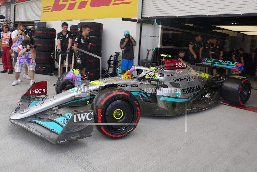 Darron Cummings Mercedes driver Lewis Hamilton of Britain pulls out of his team's garage during the first practice session for the Formula One Miami Grand Prix auto race at the Miami International Autodrome, Friday, May 6, 2022, in Miami Gardens, Fla. (AP Photo/Darron Cummings)