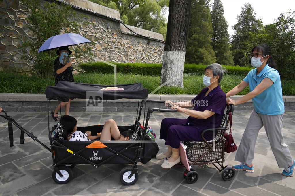 Ng Han Guan Tourists wear face masks as they visit the Summer Palace in Beijing Tuesday, Aug. 3, 2021. The current coronavirus outbreaks in China, while still in the hundreds of cases in total, have spread much more widely than previous ones, reaching multiple provinces and cities including the capital, Beijing. Many of the cases have been identified as the highly contagious delta variant that is driving a resurgence in many countries. (AP Photo/Ng Han Guan)