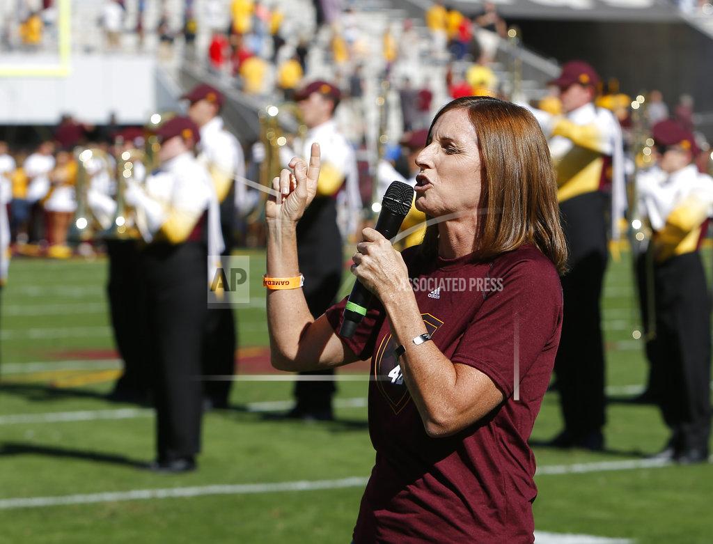 Rick Scuteri U.S. Rep. Martha McSally, R-Ariz. sings the national anthem before an NCAA college football game between Arizona State and Utah, Saturday, Nov. 3, 2018, in Tempe, Ariz. (AP Photo/Rick Scuteri)
