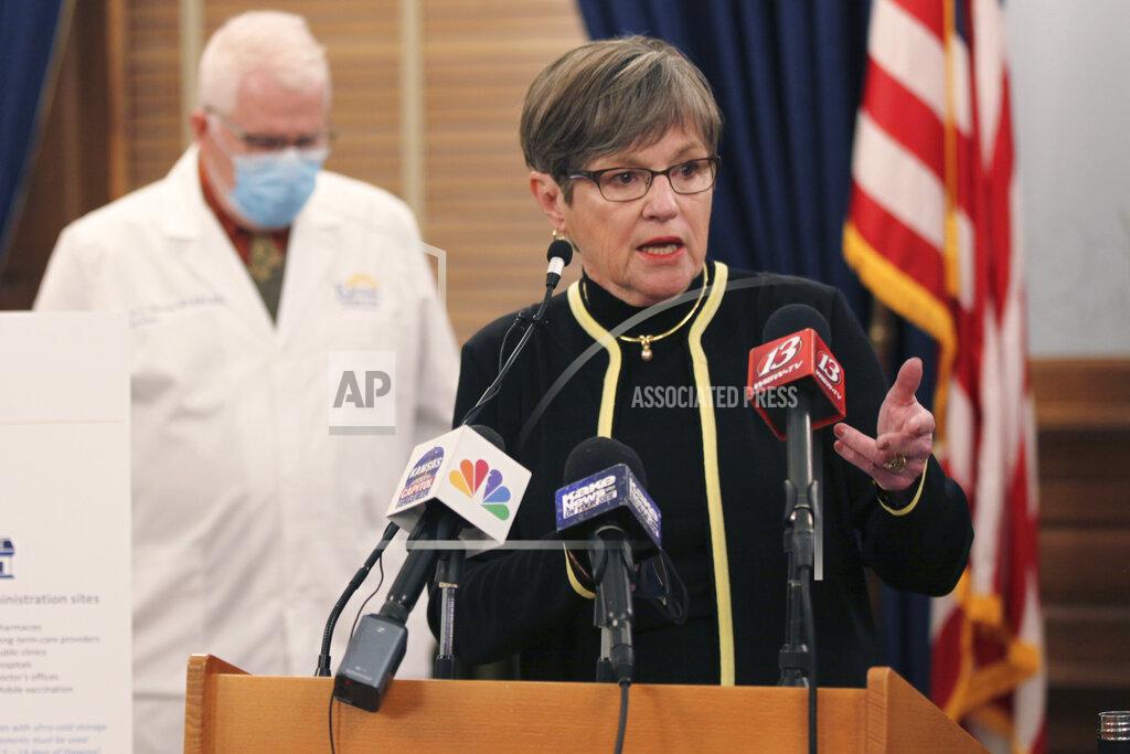 John Hanna Kansas Gov. Laura Kelly answers questions from reporters during a news conference in which she announces that the state will shut down its system for processing unemployment claims to combat fraud, Wednesday, Jan. 27, 2021, at the Statehouse in Topeka, Kan. The 2 1/2-day shutdown will delay payments to some jobless workers while the state installs anti-fraud processes. (AP Photo/John Hanna)