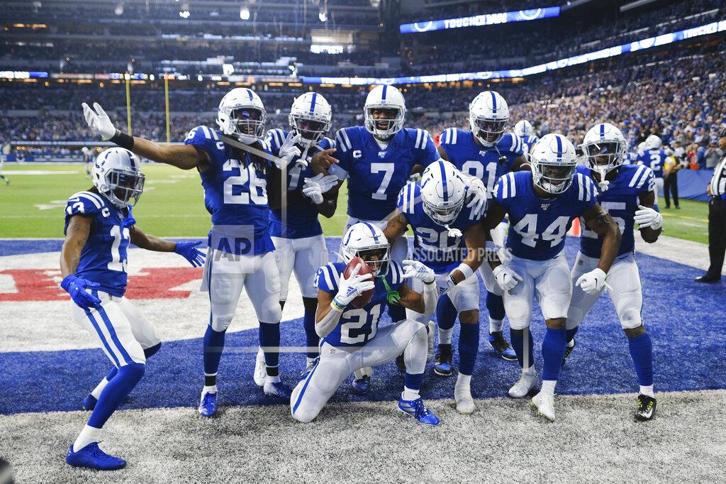 Aj Mast Indianapolis Colts running back Nyheim Hines (21) celebrates with teammates after running back a punt for a touchdown during the first half of an NFL football game against the Carolina Panthers, Sunday, Dec. 22, 2019, in Indianapolis. (AP Photo/AJ Mast)