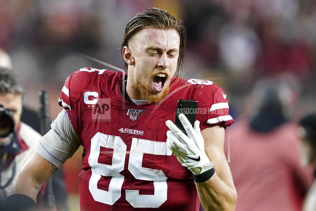 Tony Avelar San Francisco 49ers tight end George Kittle yells into a phone while celebrating after the 49ers defeated the Los Angeles Rams in an NFL football game in Santa Clara, Calif., Saturday, Dec. 21, 2019. (AP Photo/Tony Avelar)
