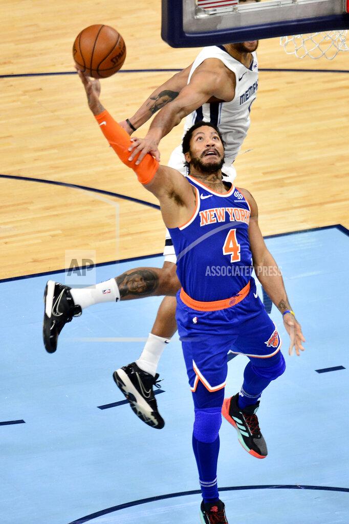 Brandon Dill New York Knicks guard Derrick Rose (4) shoots against Memphis Grizzlies forward Kyle Anderson in the second half of an NBA basketball game Monday, May 3, 2021, in Memphis, Tenn. (AP Photo/Brandon Dill)