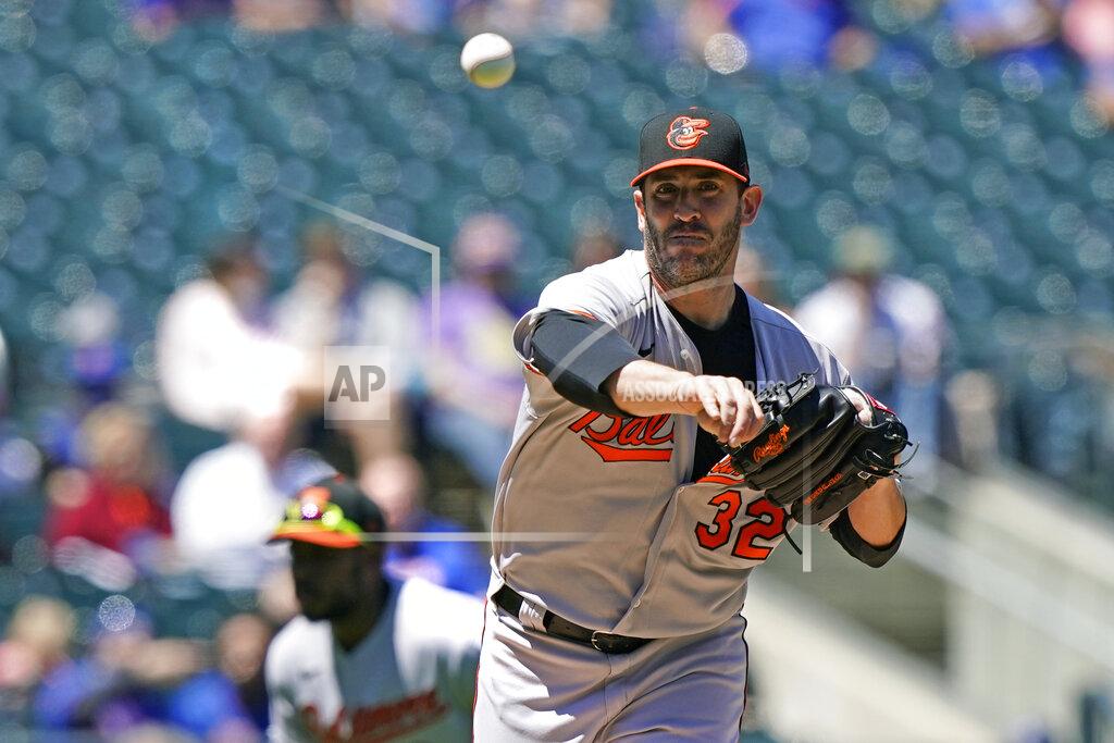 Kathy Willens Baltimore Orioles starting pitcher Matt Harvey (32) throws to first to hold New York Mets runner Francisco Lindor on base during the third inning of a baseball game, Wednesday, May 12, 2021, in New York. (AP Photo/Kathy Willens)
