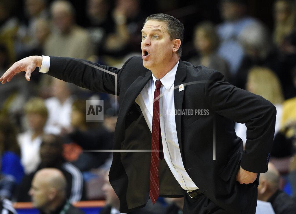 Kathy Kmonicek VMI head coach Dan Earl directs his team in the first half of an NCAA college basketball game against Wofford in the Southern Conference tournament championship, Saturday, March 9, 2018, in Asheville, N.C. Wofford won 97-72. (AP Photo/Kathy Kmonicek)