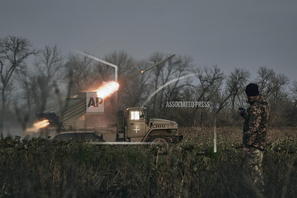 Libkos Ukrainian military's Grad multiple rocket launcher fires rockets at Russian positions in the frontline near Bakhmut, Donetsk region, Ukraine, Thursday, Nov. 24, 2022. (AP Photo/LIBKOS)