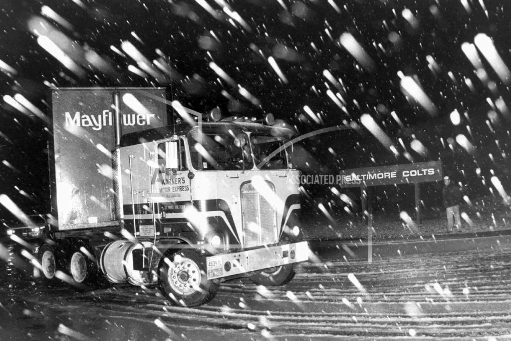 Lloyd Pearson FILE - In this March 19, 1984, file photo, a moving van carrying the Baltimore Colts' equipment leaves Baltimore for Indianapolis in the middle of the night. Colts owner Robert Irsay relocated his team to Indianapolis without any public announcement _ leaving fans in both cities stunned when they woke up that morning. (Lloyd Pearson/The Baltimore Sun via AP, File)