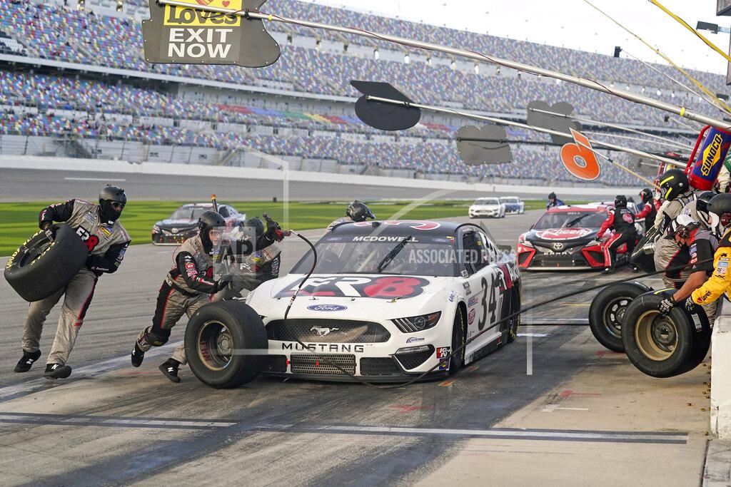 John Raoux FILE - Michael McDowell makes a pit stop for fuel and tires during the NASCAR Cup Series road course auto race at Daytona International Speedway in Daytona Beach, Fla., in this Sunday, Feb. 21, 2021, file photo. Michael McDowell followed his Daytona 500 victory with a pair of top-10 finishes. That's three in three races, one shy of his total from all of 2020. Perhaps his Front Row Motorsports team really has turned the corner. (AP Photo/John Raoux, File)