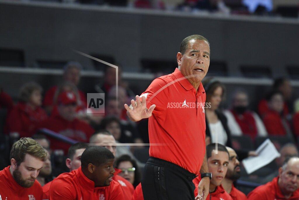 Justin Rex Houston coach Kelvin Sampson motions to a referee during the first half of the team's NCAA college basketball game against Northwestern State on Tuesday, Nov. 30, 2021, in Houston. (AP Photo/Justin Rex)