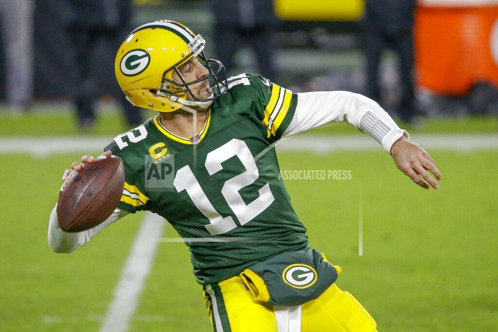 Mike Roemer Green Bay Packers' Aaron Rodgers throws a pass during the second half of an NFL football game against the Philadelphia Eagles Sunday, Dec. 6, 2020, in Green Bay, Wis. (AP Photo/Mike Roemer)