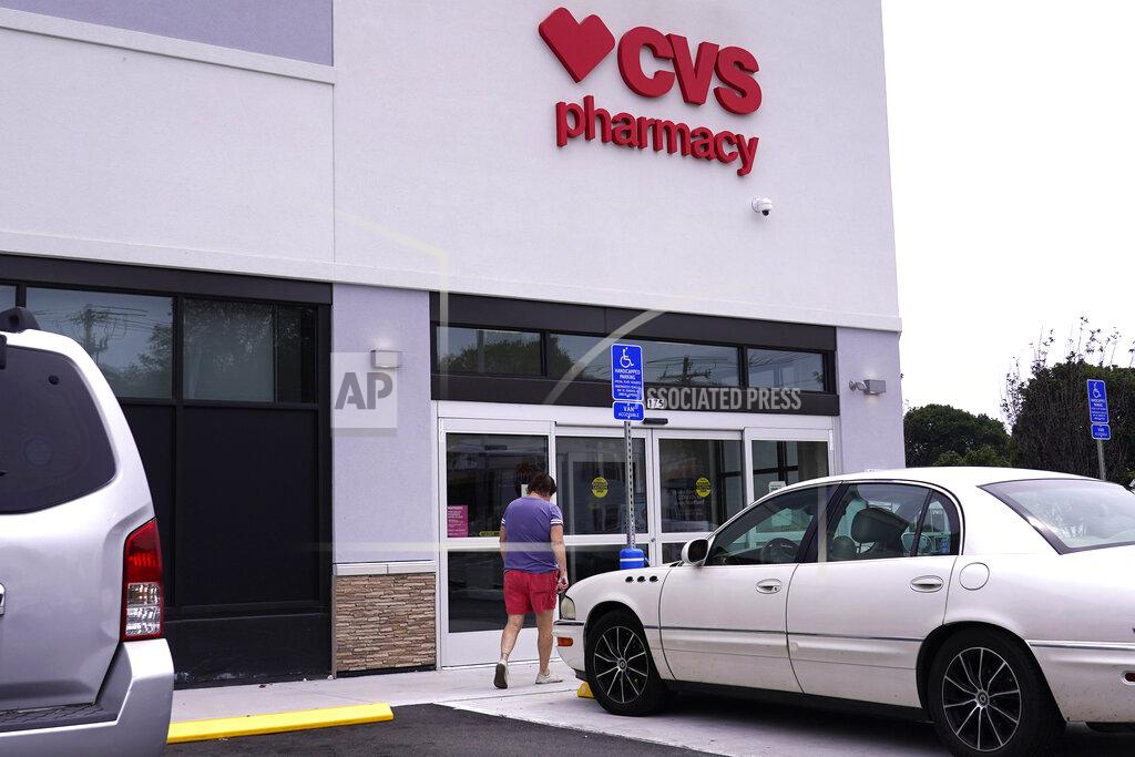 Charles Krupa FILE - A customer walks into a CVS Pharmacy store, Tuesday, Aug. 3, 2021, in Woburn, Mass. The Food and Drug Administration said Wednesday, July 6, 2022, that pharmacies could now prescribe Pfizer's Paxlovid pill directly to COVID-19 patients. (AP Photo/Charles Krupa, File)