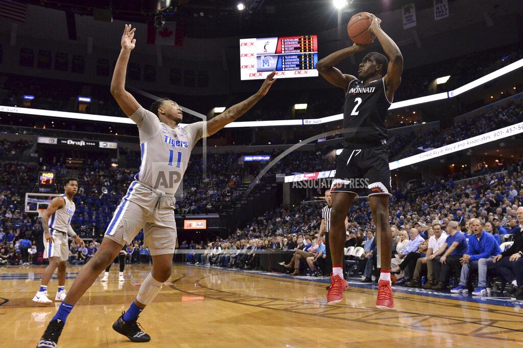 Brandon Dill Cincinnati guard Keith Williams (2) shoots against Memphis guard Antwann Jones (11) in the second half of an NCAA college basketball game Thursday, Feb. 7, 2019, in Memphis, Tenn. (AP Photo/Brandon Dill)