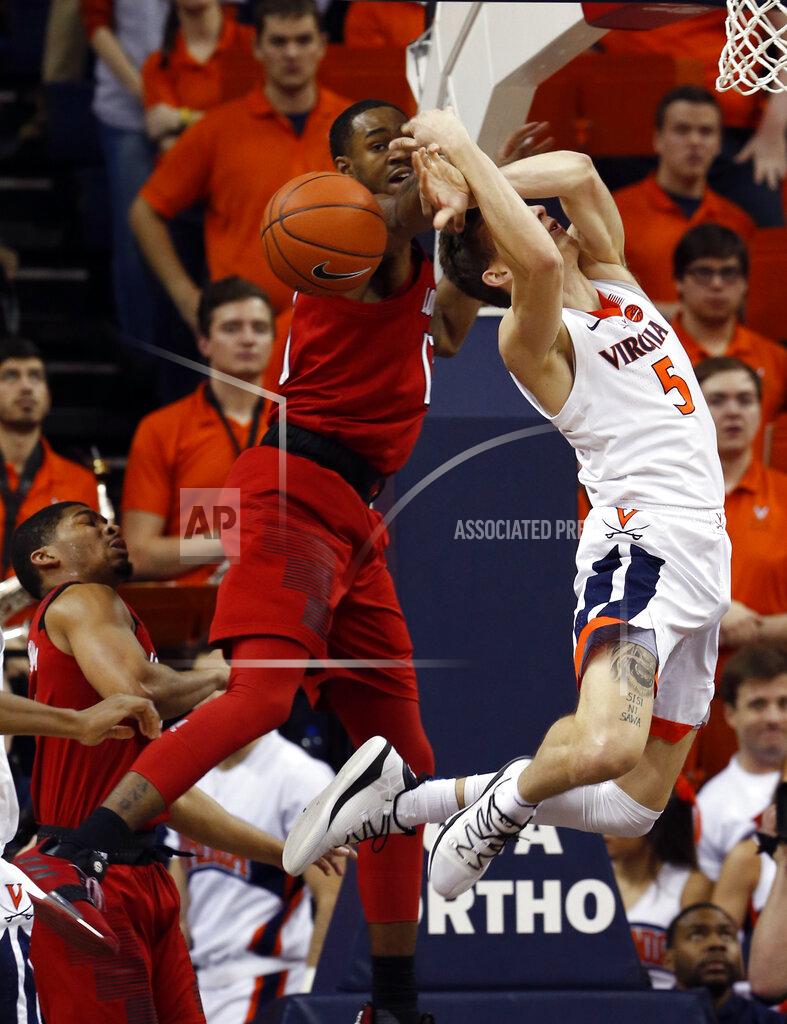 Steve Helber Louisville guard Christen Cunningham (1) strips the ball from Virginia guard Kyle Guy (5) during the first half of an NCAA college basketball game in Charlottesville, Va., Saturday, March 9, 2019. (AP Photo/Steve Helber)