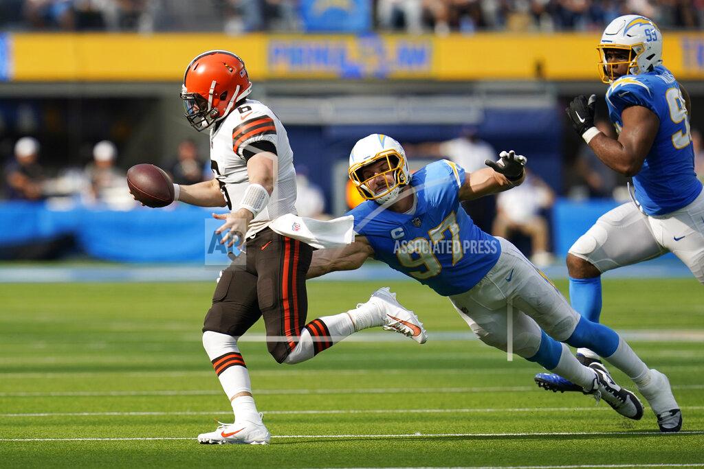 Gregory Bull Los Angeles Chargers defensive end Joey Bosa (97) goes after Cleveland Browns quarterback Baker Mayfield during the second half of an NFL football game Sunday, Oct. 10, 2021, in Inglewood, Calif. (AP Photo/Gregory Bull)