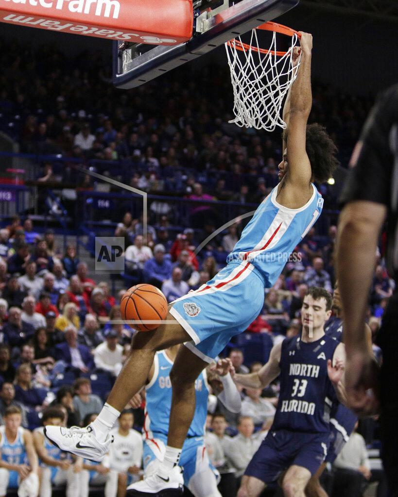 Young Kwak Gonzaga center Efton Reid III dunks during the second half of an NCAA college basketball game against North Florida, Monday, Nov. 7, 2022, in Spokane, Wash. Gonzaga won 104-63. (AP Photo/Young Kwak)