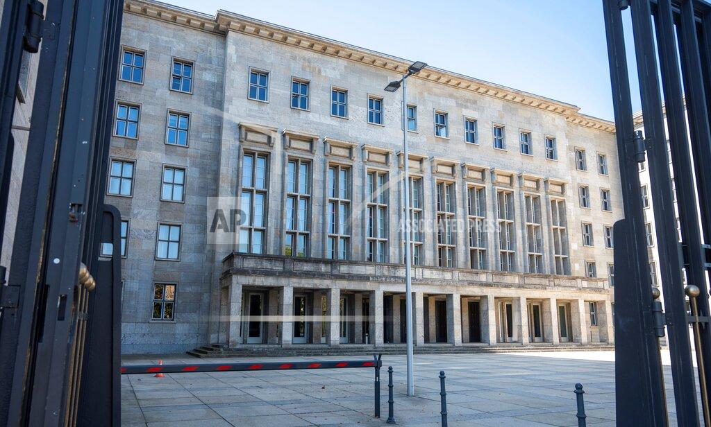 Christophe Gateau Exterior view of the Federal Finance Ministry in Berlin, Germany, Thursday, Sept. 9, 2021. Investigators have carried out searches at the German finance and justice ministries in a probe of suspected obstruction of justice by employees of a unit of the country's customs service that fights money laundering. Word of the searches come just over two weeks ahead of a parliamentary election in which Finance Minister Olaf Scholz is running for chancellor. (Christophe Gateau/dpa via AP)