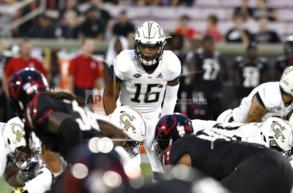 Timothy D. Easley Georgia Tech quarterback TaQuon Marshall (16) shouts to his team during the first half of an NCAA college football game against Louisville, Friday, Oct. 5, 2018, in Louisville, Ky. (AP Photo/Timothy D. Easley)