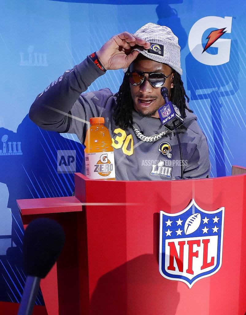 David J. Phillip Los Angeles Rams' Todd Gurley adjusts his hat during Opening Night for the NFL Super Bowl 53 football game Monday, Jan. 28, 2019, in Atlanta. (AP Photo/David J. Phillip)