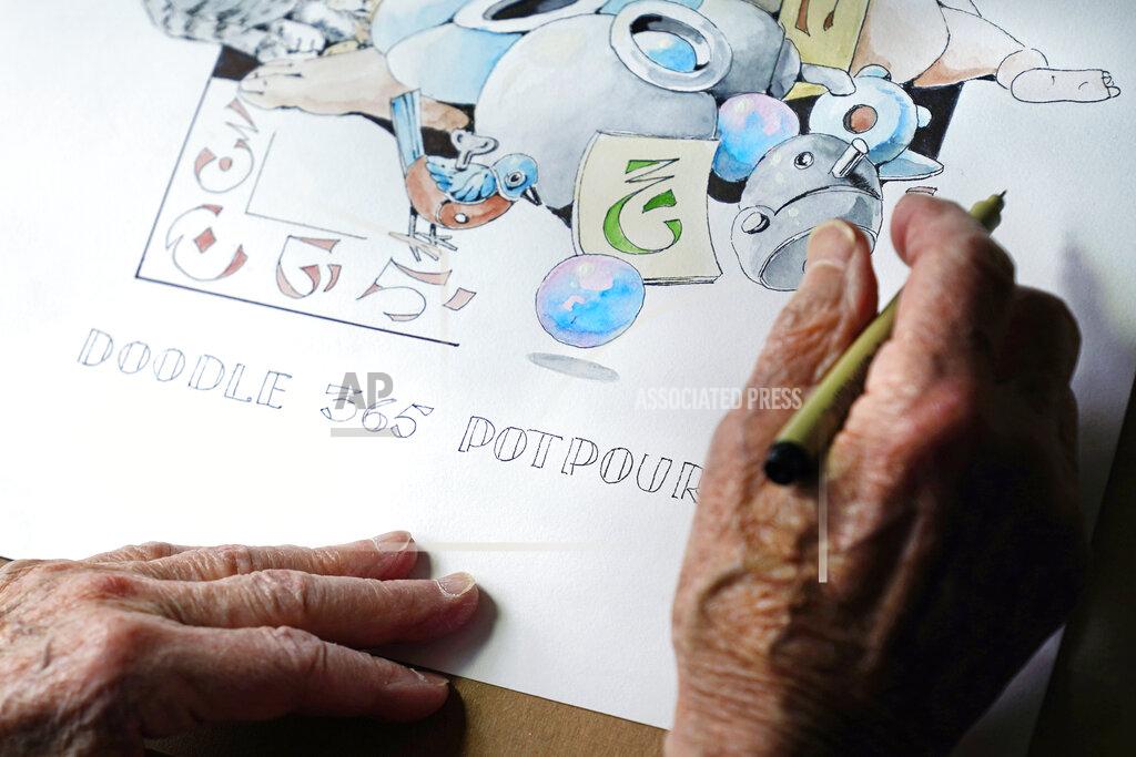Charles Krupa Artist Robert Seaman works on his 365th daily doodle in his room at an assisted living facility Monday, May 10, 2021, in Westmoreland, N.H. Seaman, who moved into the facility weeks before the COVID-19 pandemic shutdown his outside world in 2020, recently completed his 365th daily sketch, or what he calls his "Covid Doodles", since being isolated due to the virus outbreak. (AP Photo/Charles Krupa)