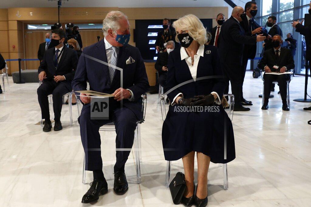 Yorgos Karahalis Britain's Prince Charles, left, and his wife Camilla, the Duchess of Cornwall, attend a ceremony at Greece's newly renovated National Gallery in Athens, Wednesday, March 24, 2021. Greece on Wednesday kicked off two days of celebrations to mark the bicentenary of the start of the country's war of independence, although events are far more muted than originally planned due to the pandemic. (AP Photo/Yorgos Karahalis)