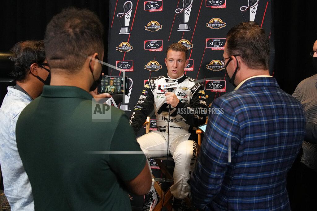 Rick Scuteri AJ Allmendinger speaks during media day ahead of Saturday's NASCAR Xfinity Cup Series championship auto race Thursday, Nov. 4, 2021, in Phoenix. (AP Photo/Rick Scuteri)