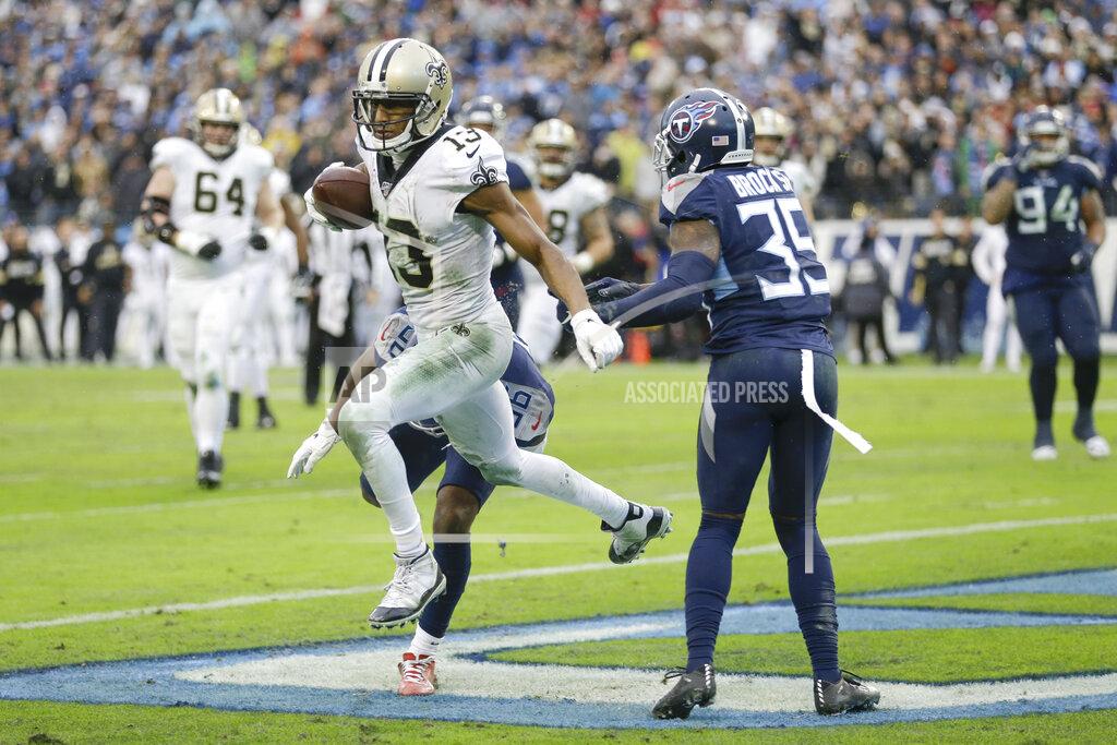 James Kenney New Orleans Saints wide receiver Michael Thomas (13) scores a touchdown on a 2-yard pass reception ahead of Tennessee Titans cornerback Tramaine Brock Sr. in the second half of an NFL football game Sunday, Dec. 22, 2019, in Nashville, Tenn. The Saints won 38-28. (AP Photo/James Kenney)