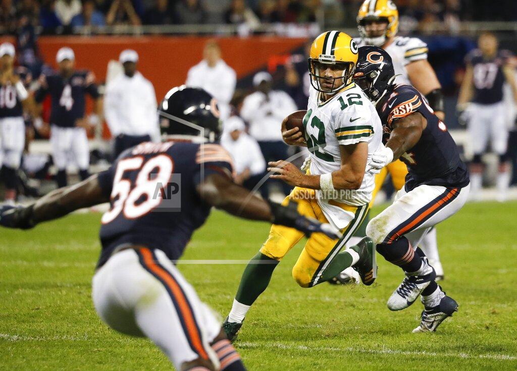 Charles Rex Arbogast Green Bay Packers' Aaron Rodgers runs during the second half of an NFL football game against the Chicago Bears Thursday, Sept. 5, 2019, in Chicago. (AP Photo/Charles Rex Arbogast)