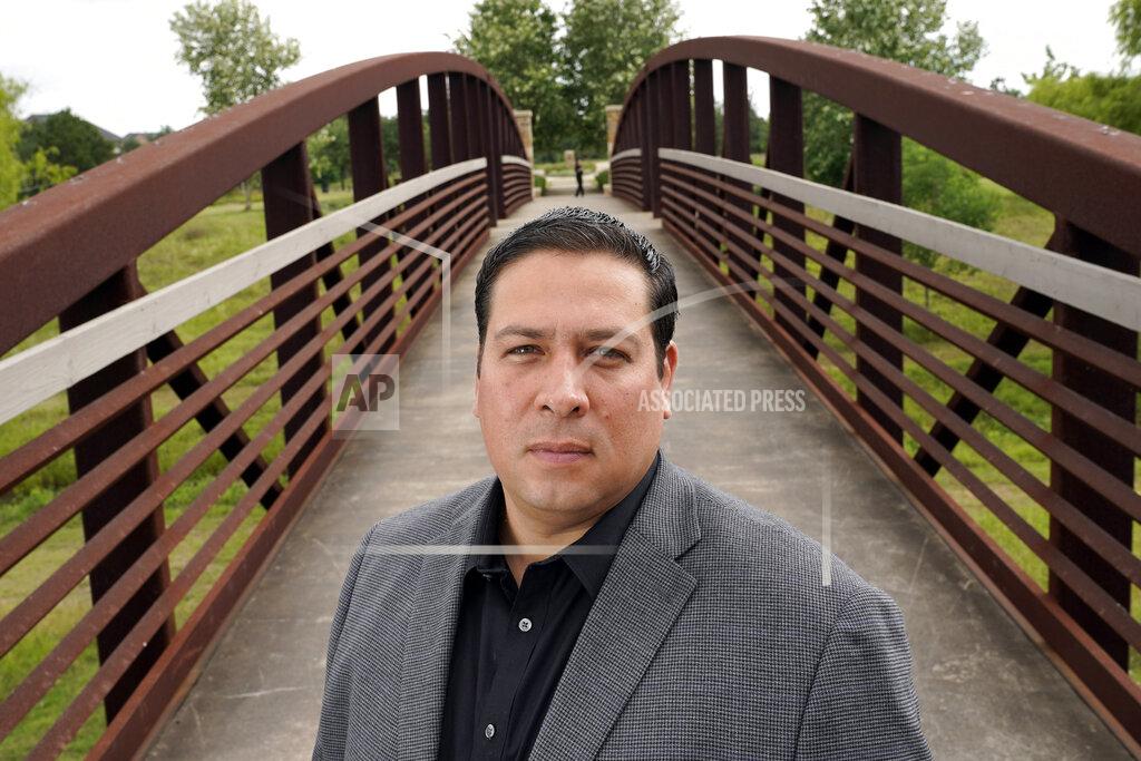 Jose Sagaseta poses for a photograph near his home in Fulshear, Texas, Monday, May 4, 2020. Sagaseta thought his job of eight years with an oilfield services company in Houston was safe. He was laid off in mid-April. Like in other cities, the coronavirus has shut down much of Houston's economic activity, slashing thousands of jobs, while at the same time, the price of oil plunged below zero recently as demand plummeted due to the worldwide lockdown to stop the spread of the virus. (AP Photo/David J. Phillip)