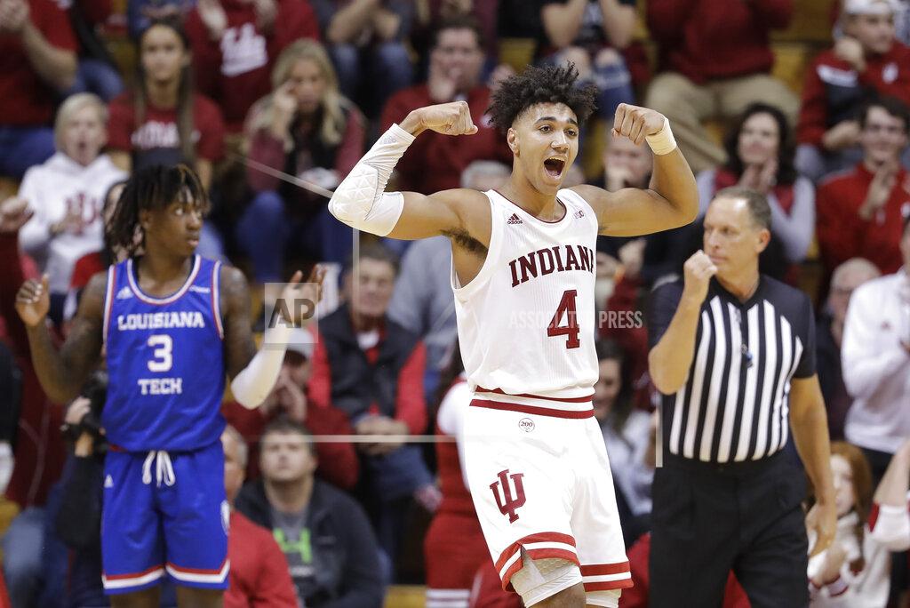 Darron Cummings Indiana's Trayce Jackson-Davis (4) reacts after making a shot and getting fouled by Louisiana Tech's Amorie Archibald (3) during the second half of an NCAA college basketball game, Monday, Nov. 25, 2019, in Bloomington, Ind. Indiana won 88-75. (AP Photo/Darron Cummings)
